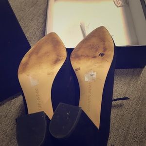 Lady’s angle strap pointed black suede heels